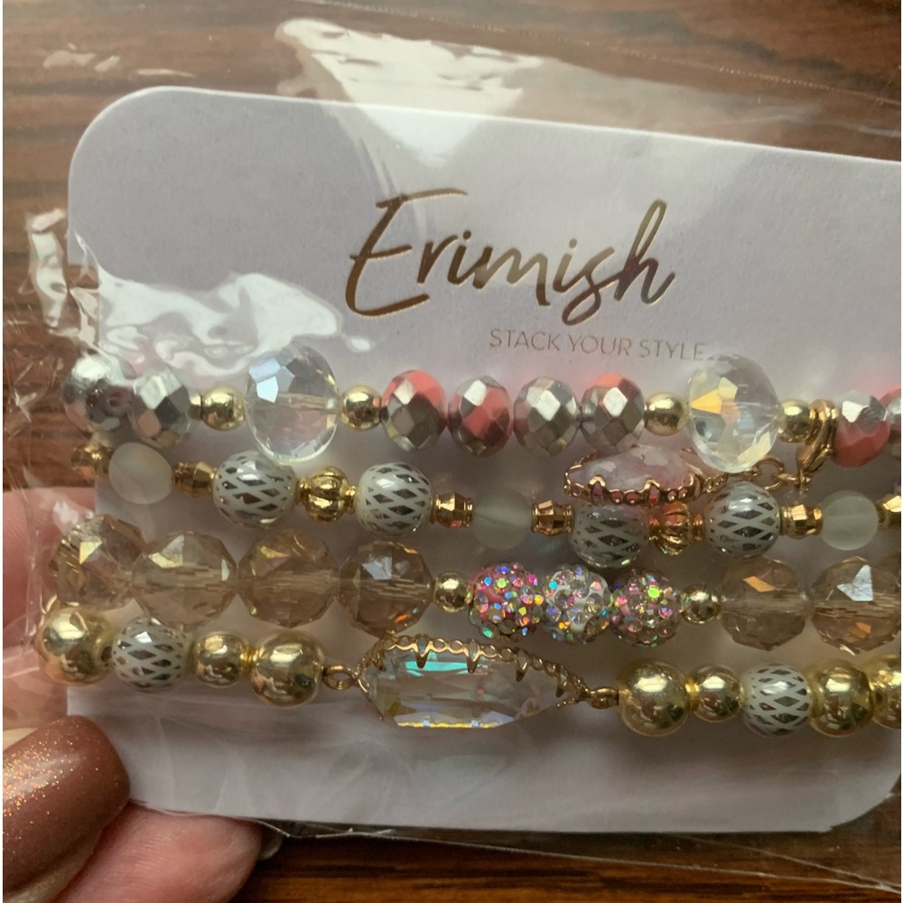 NEW Erimish stack clear, gold, silver and pink. BEAUTIFUL!! Set of 4 bracelets